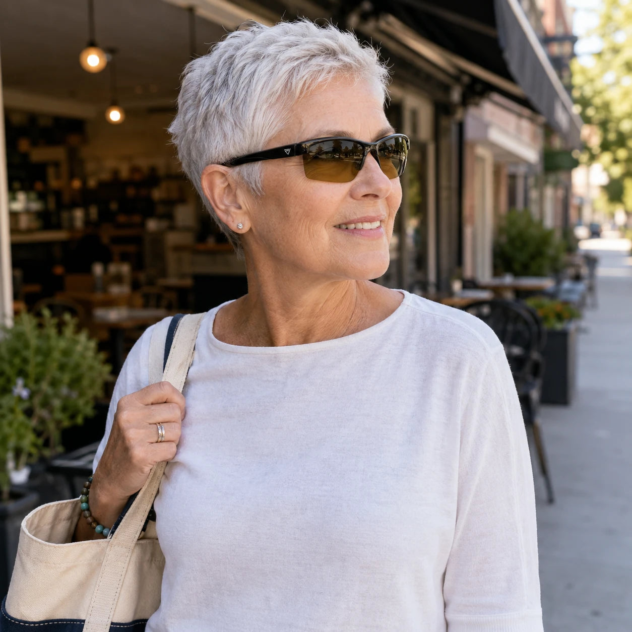 Everyday activity featuring PeakVision GX5 sunglasses with silver temple emblem