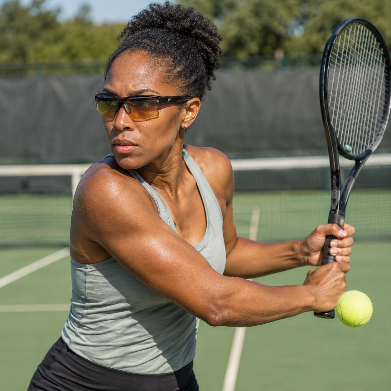 Tennis activity featuring PeakVision GX5 sunglasses with silver temple emblem